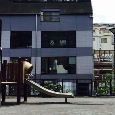 a photo of an empty playground slide